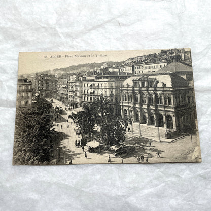 Lot of 1910s Algiers postcards showing French colonial city views, harbor, train station, and theater architecture.