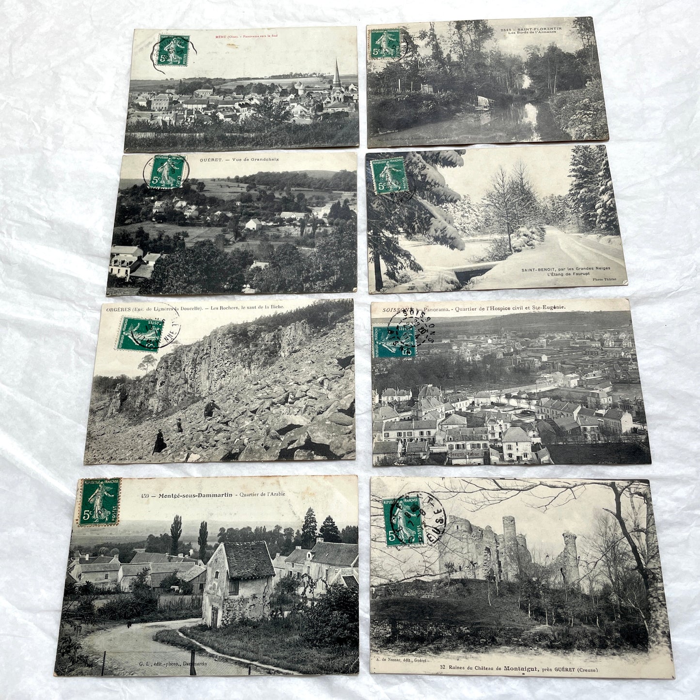1910s French Postcard Lot - 8 vintage black and white postcards featuring diverse village scenes and landscapes.