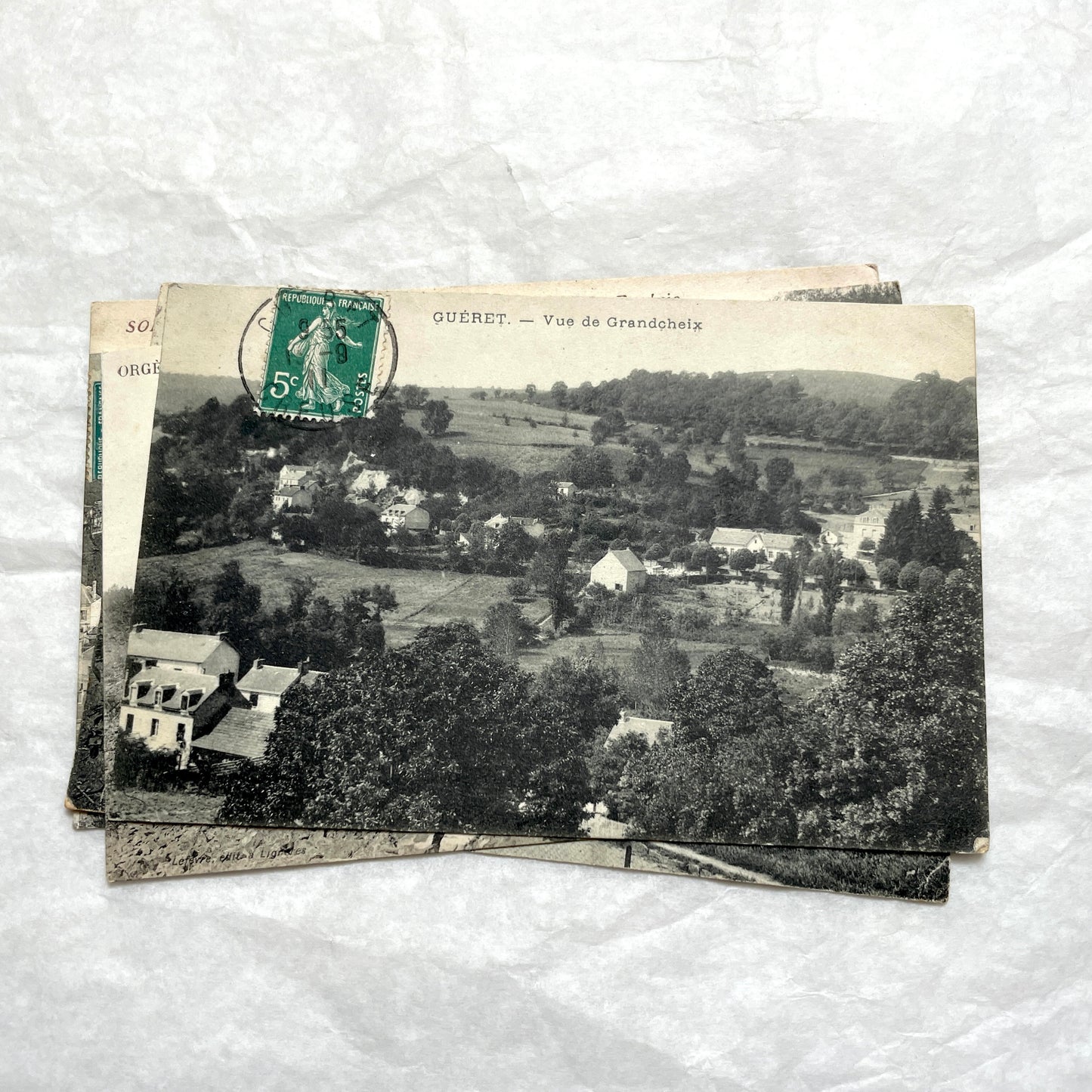 1910s French Postcard Lot - 8 vintage black and white postcards featuring diverse village scenes and landscapes.