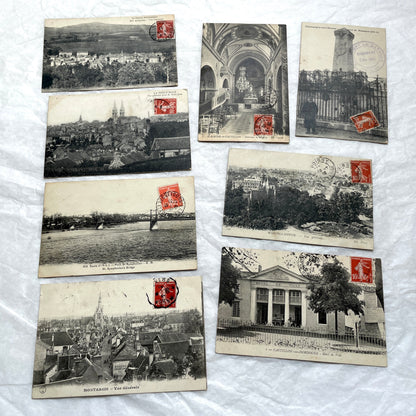 Lot of 8 1910s French postcards showing various historic town views, architecture, and landscapes with stamps.