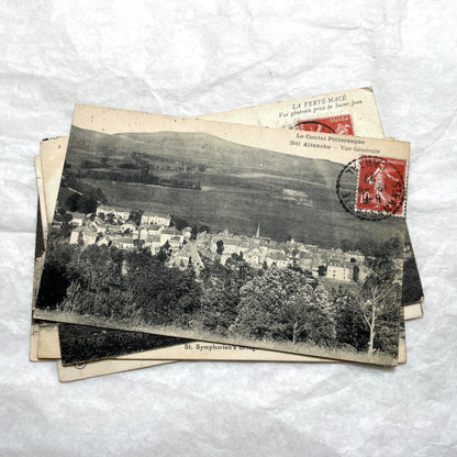 Lot of 8 1910s French postcards showing various historic town views, architecture, and landscapes with stamps.
