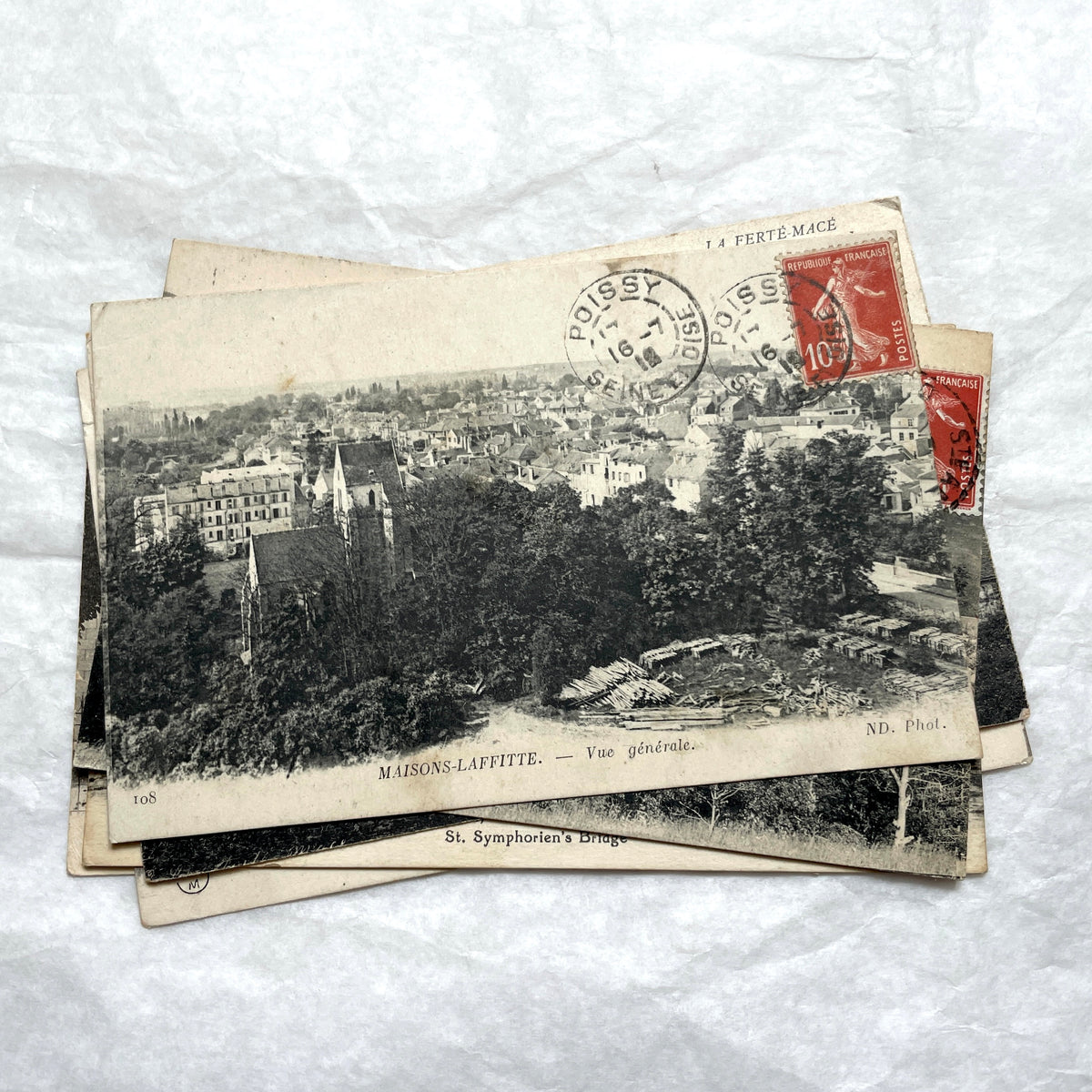 Lot of 8 1910s French postcards showing various historic town views, architecture, and landscapes with stamps.