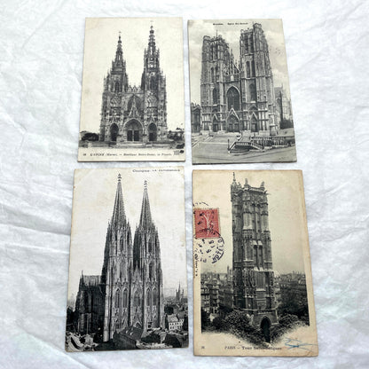 Four 1900s vintage postcards featuring detailed black and white views of European Gothic cathedrals and iconic towers.