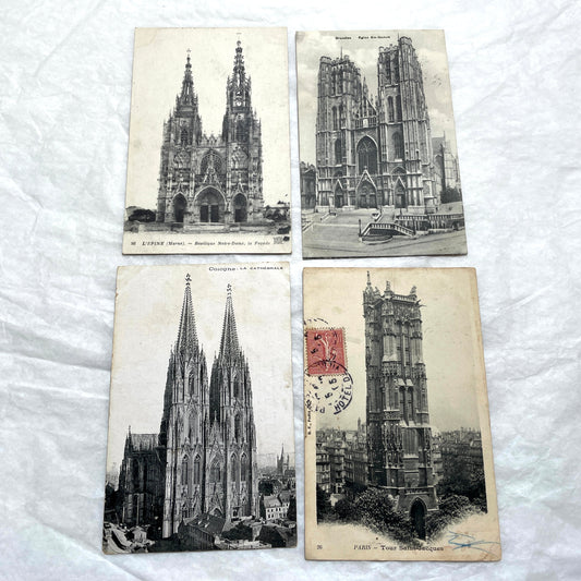 Four 1900s vintage postcards featuring detailed black and white views of European Gothic cathedrals and iconic towers.