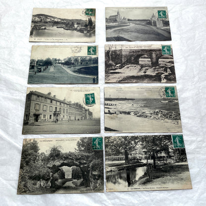 Lot of 8 1900s French postcards depicting various early 20th-century French towns, cities, and landscapes.