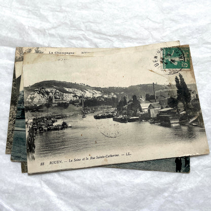 Lot of 8 1900s French postcards depicting various early 20th-century French towns, cities, and landscapes.
