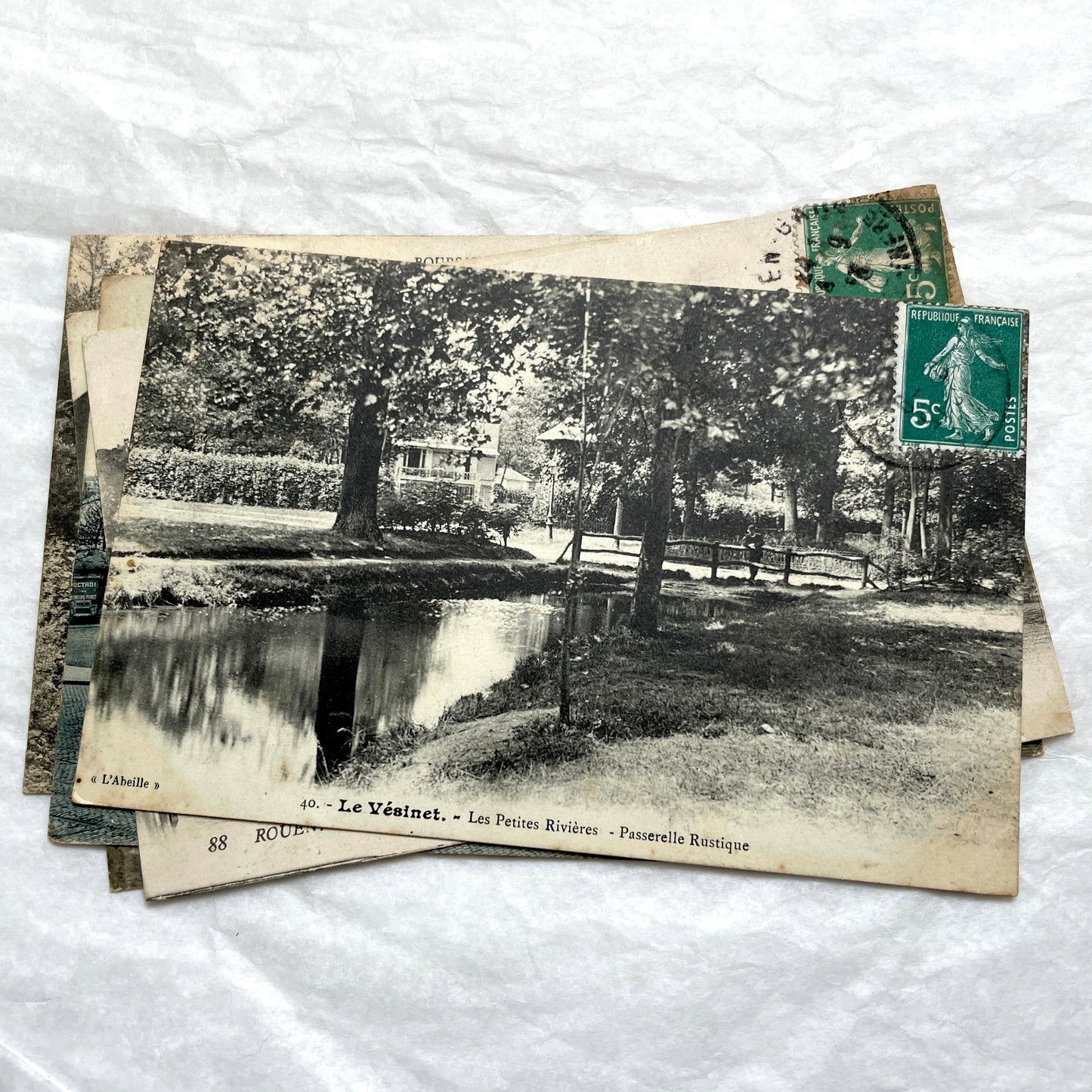 Lot of 8 1900s French postcards depicting various early 20th-century French towns, cities, and landscapes.