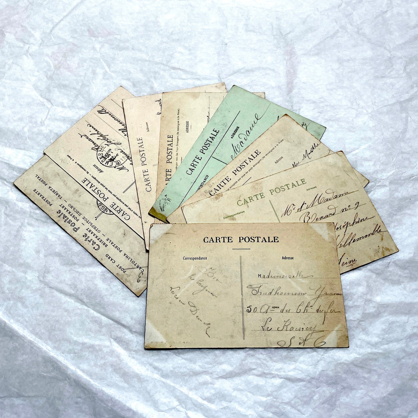 Lot of 8 1900s French postcards depicting various early 20th-century French towns, cities, and landscapes.