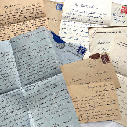 Lot of antique French letters from the 1930s, featuring handwritten notes, envelopes, and vintage stamps.