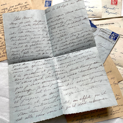 Lot of antique French letters from the 1930s, featuring handwritten notes, envelopes, and vintage stamps.
