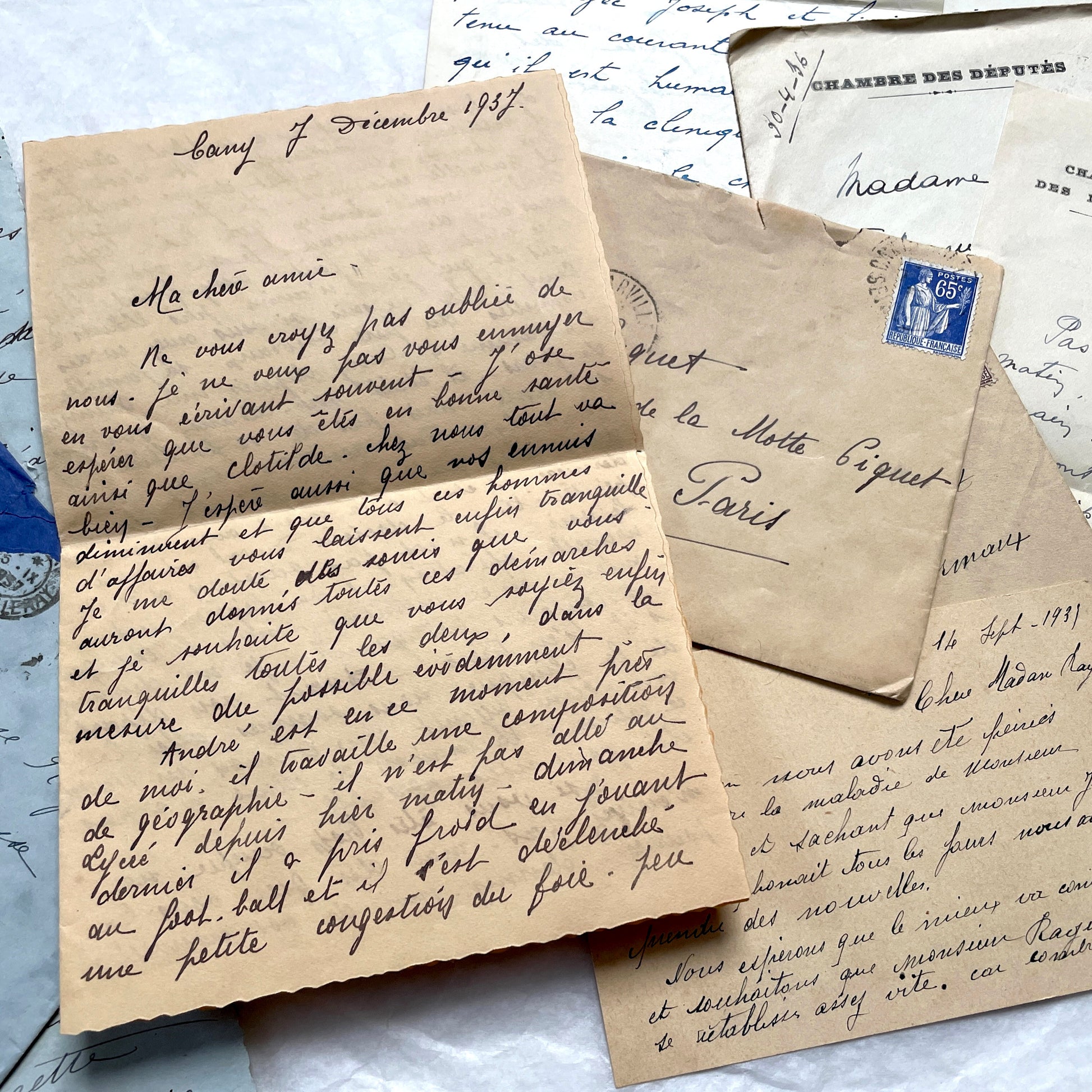 Lot of antique French letters from the 1930s, featuring handwritten notes, envelopes, and vintage stamps.