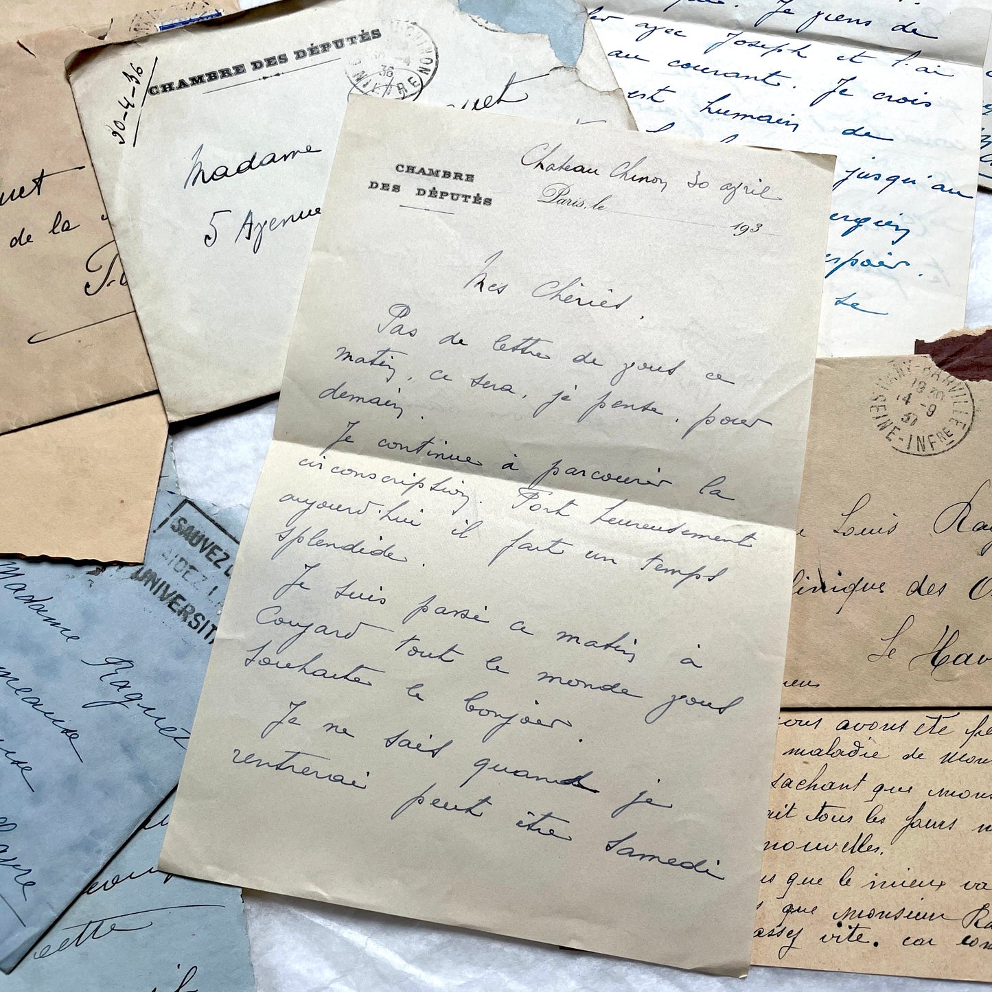 Lot of antique French letters from the 1930s, featuring handwritten notes, envelopes, and vintage stamps.