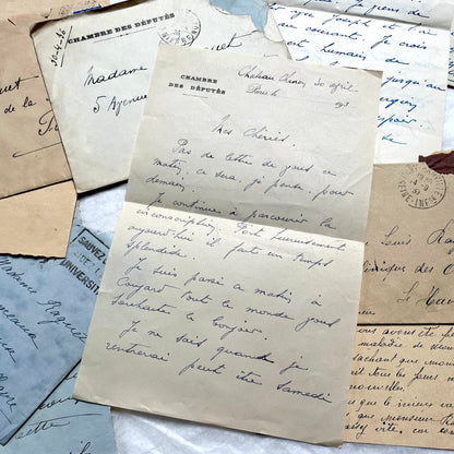 Lot of antique French letters from the 1930s, featuring handwritten notes, envelopes, and vintage stamps.