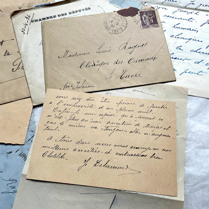 Lot of antique French letters from the 1930s, featuring handwritten notes, envelopes, and vintage stamps.