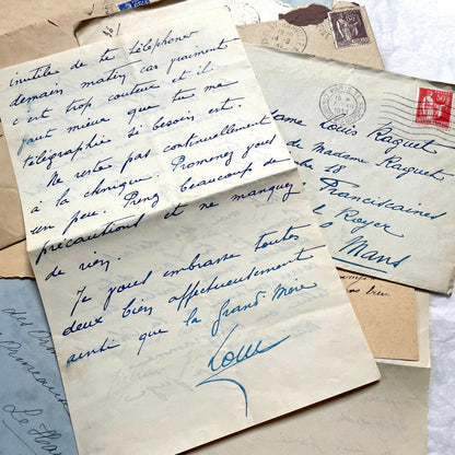 Lot of antique French letters from the 1930s, featuring handwritten notes, envelopes, and vintage stamps.