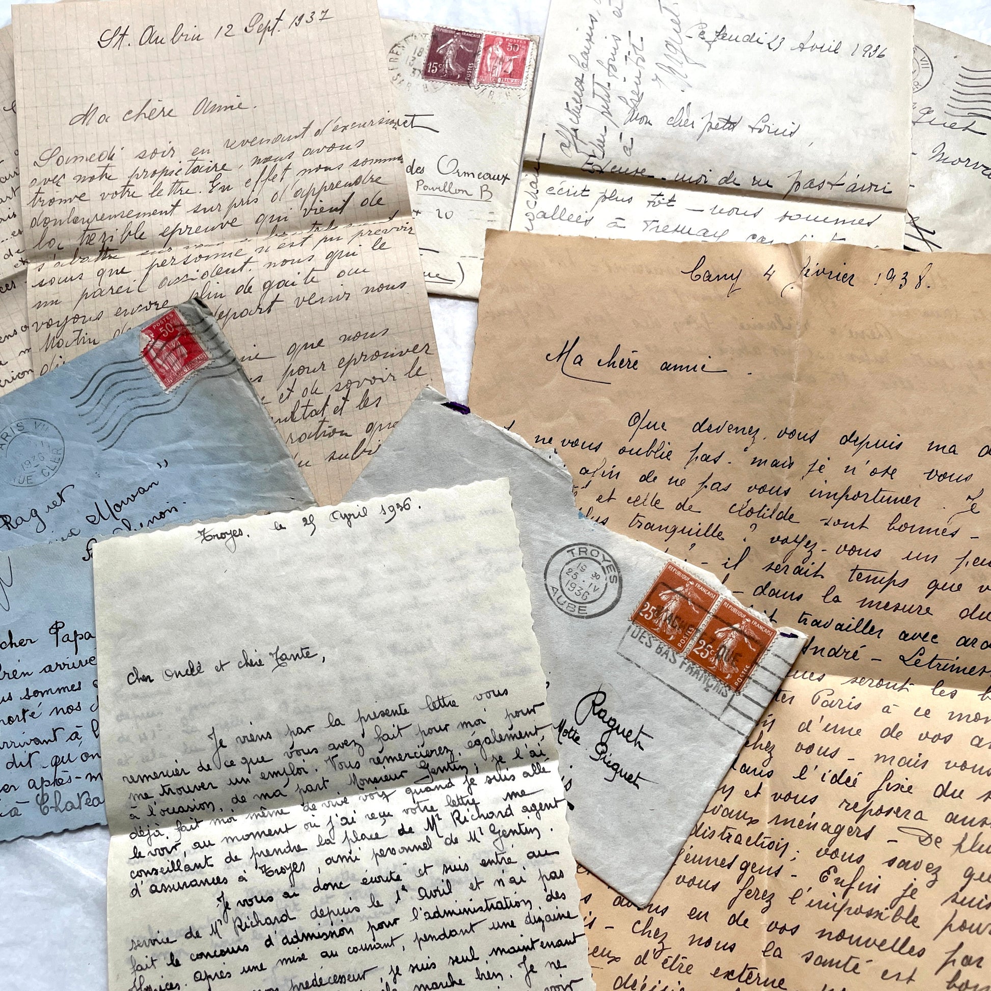 1930s French vintage letter lot with handwritten script, original stamps, and historical postmarks.