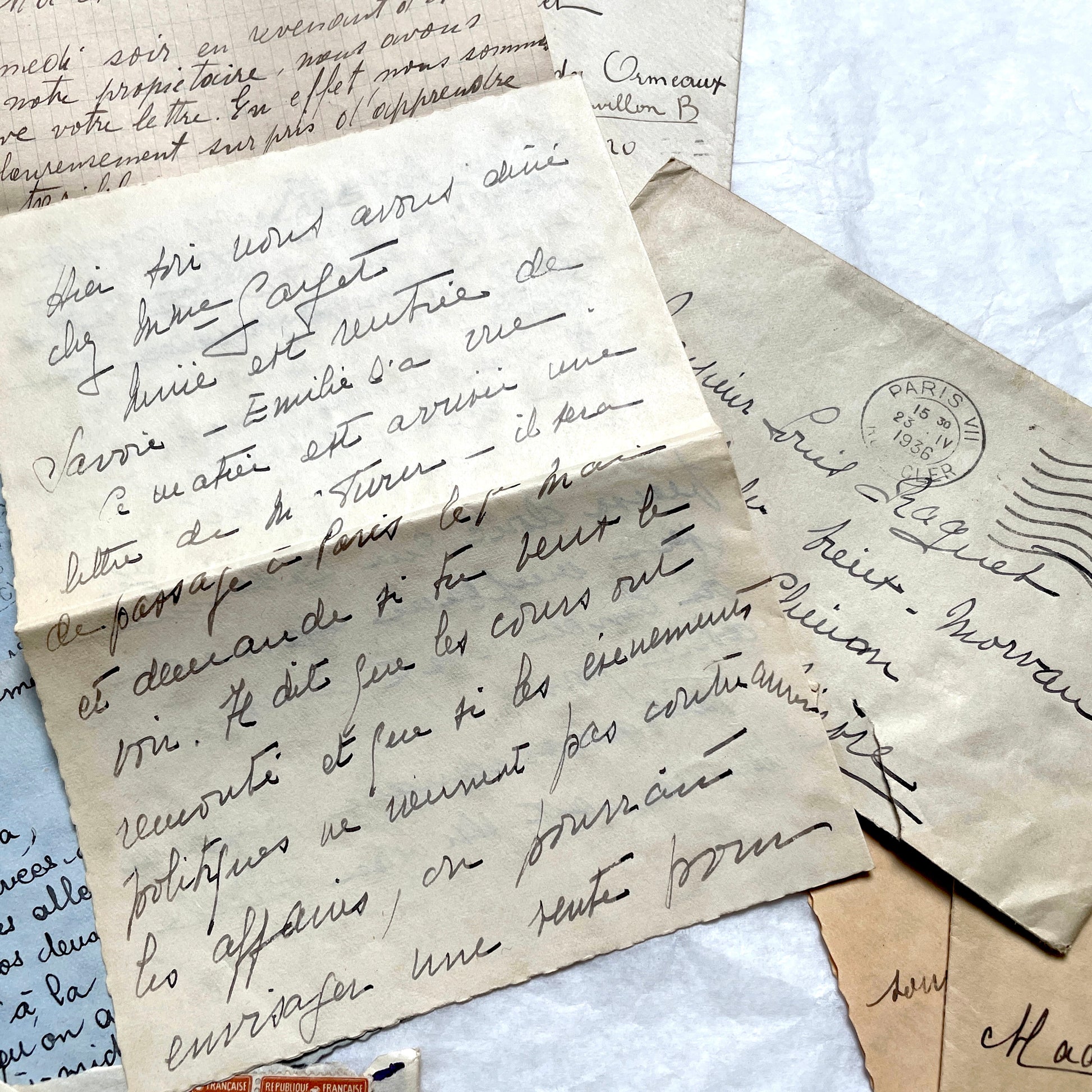 1930s French vintage letter lot with handwritten script, original stamps, and historical postmarks.