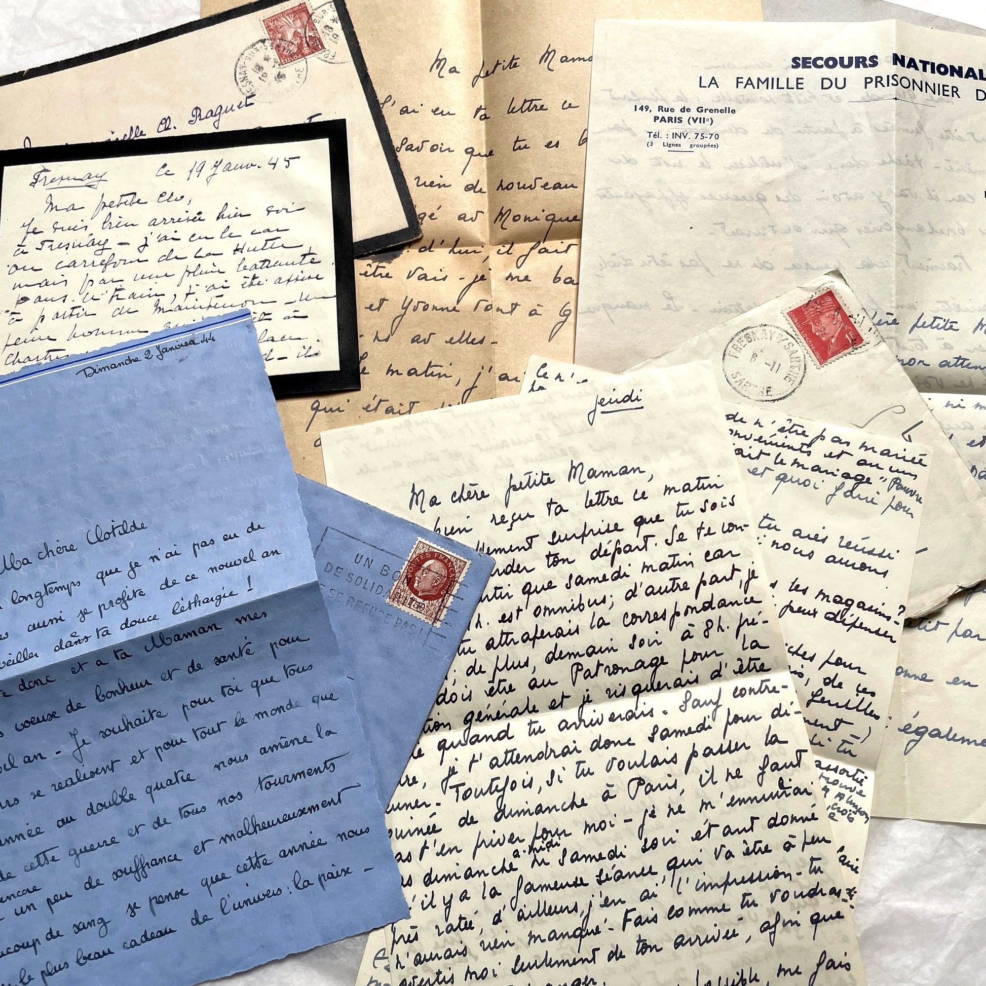 1940s French wartime letters lot with handwritten script, original stamps, and a 'Prisonnier de Guerre' document.
