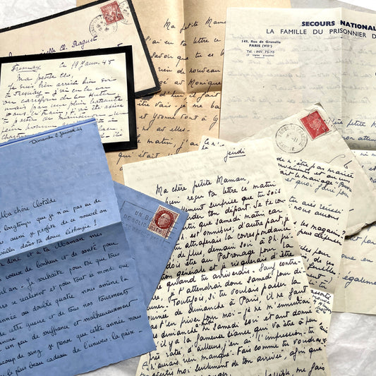1940s French wartime letters lot with handwritten script, original stamps, and a 'Prisonnier de Guerre' document.