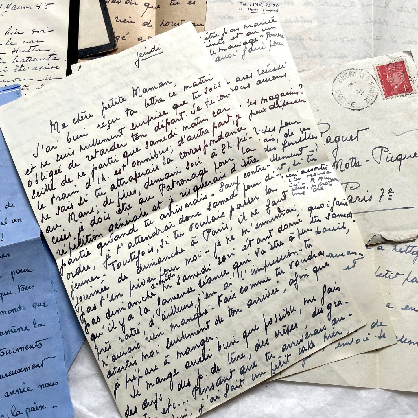 1940s French wartime letters lot with handwritten script, original stamps, and a 'Prisonnier de Guerre' document.