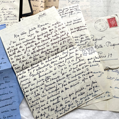 1940s French wartime letters lot with handwritten script, original stamps, and a 'Prisonnier de Guerre' document.