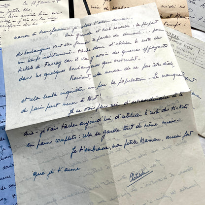 1940s French wartime letters lot with handwritten script, original stamps, and a 'Prisonnier de Guerre' document.