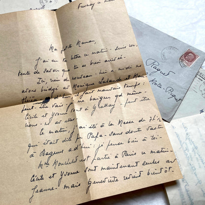1940s French wartime letters lot with handwritten script, original stamps, and a 'Prisonnier de Guerre' document.