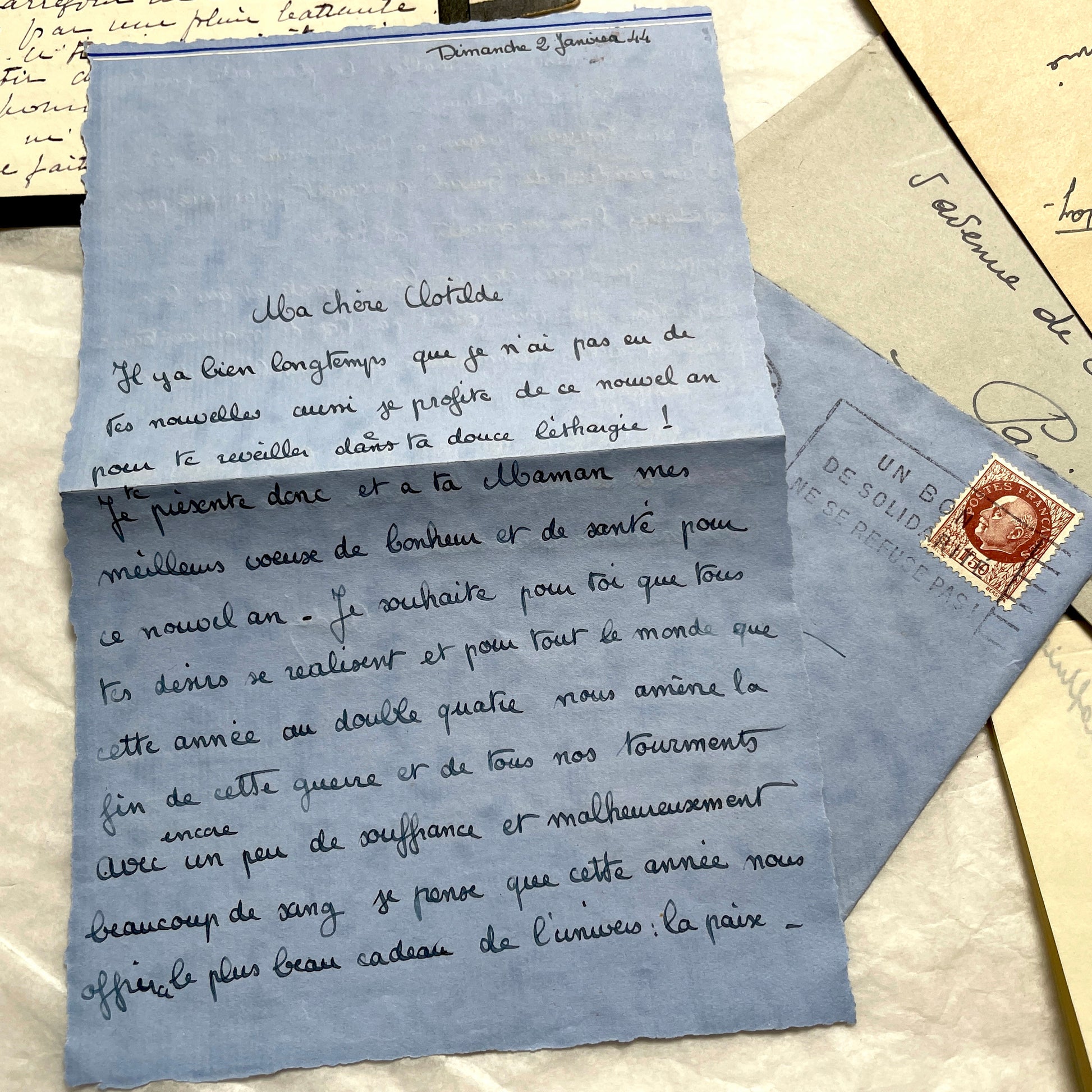 1940s French wartime letters lot with handwritten script, original stamps, and a 'Prisonnier de Guerre' document.
