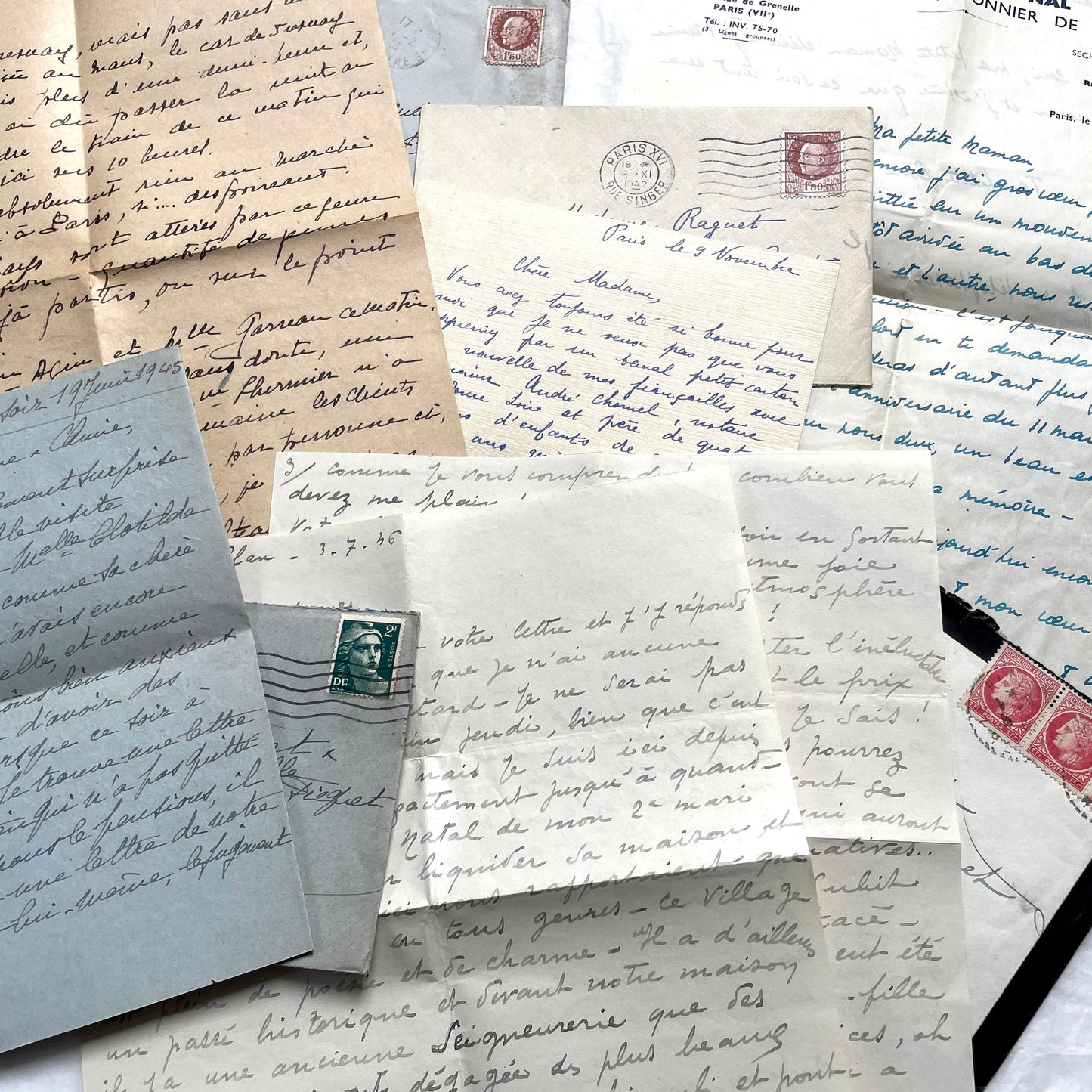 Lot of 1940s French handwritten letters with vintage stamps and postmarks, showcasing old European correspondence.