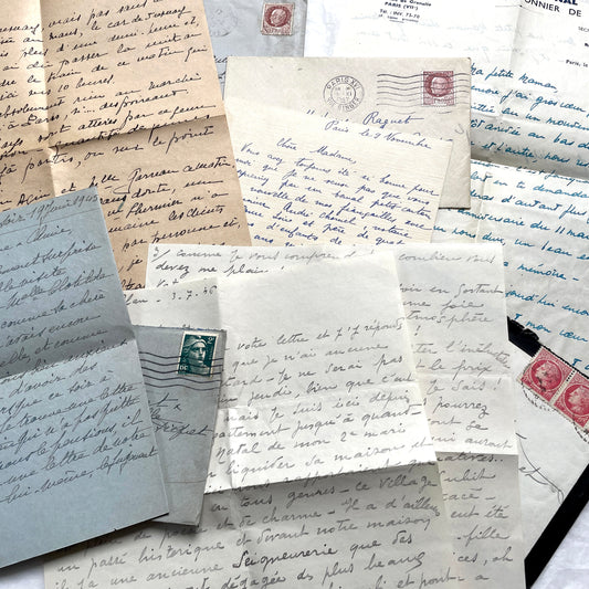 Lot of 1940s French handwritten letters with vintage stamps and postmarks, showcasing old European correspondence.