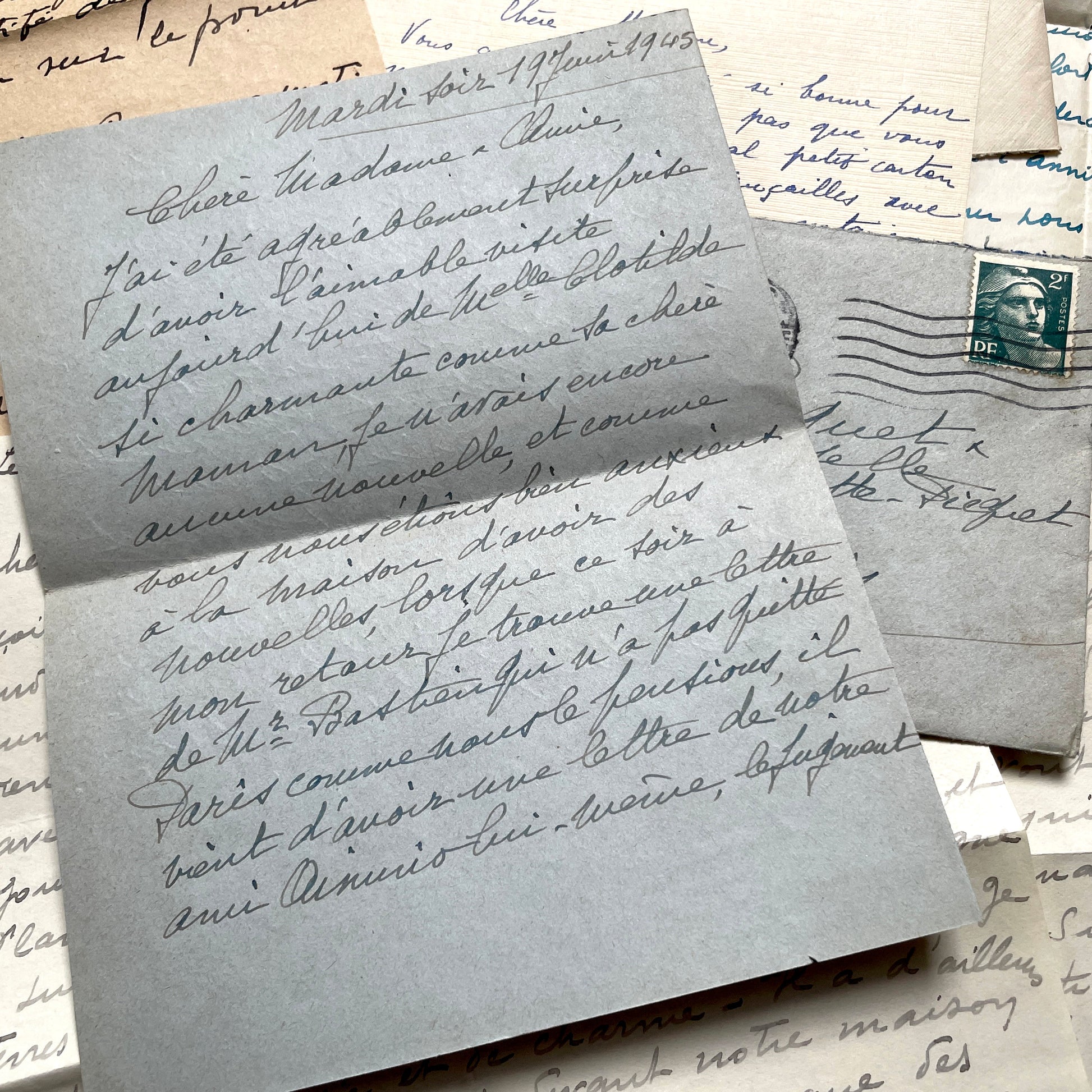 Lot of 1940s French handwritten letters with vintage stamps and postmarks, showcasing old European correspondence.