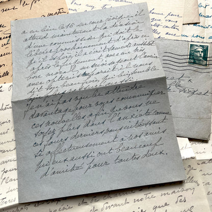 Lot of 1940s French handwritten letters with vintage stamps and postmarks, showcasing old European correspondence.