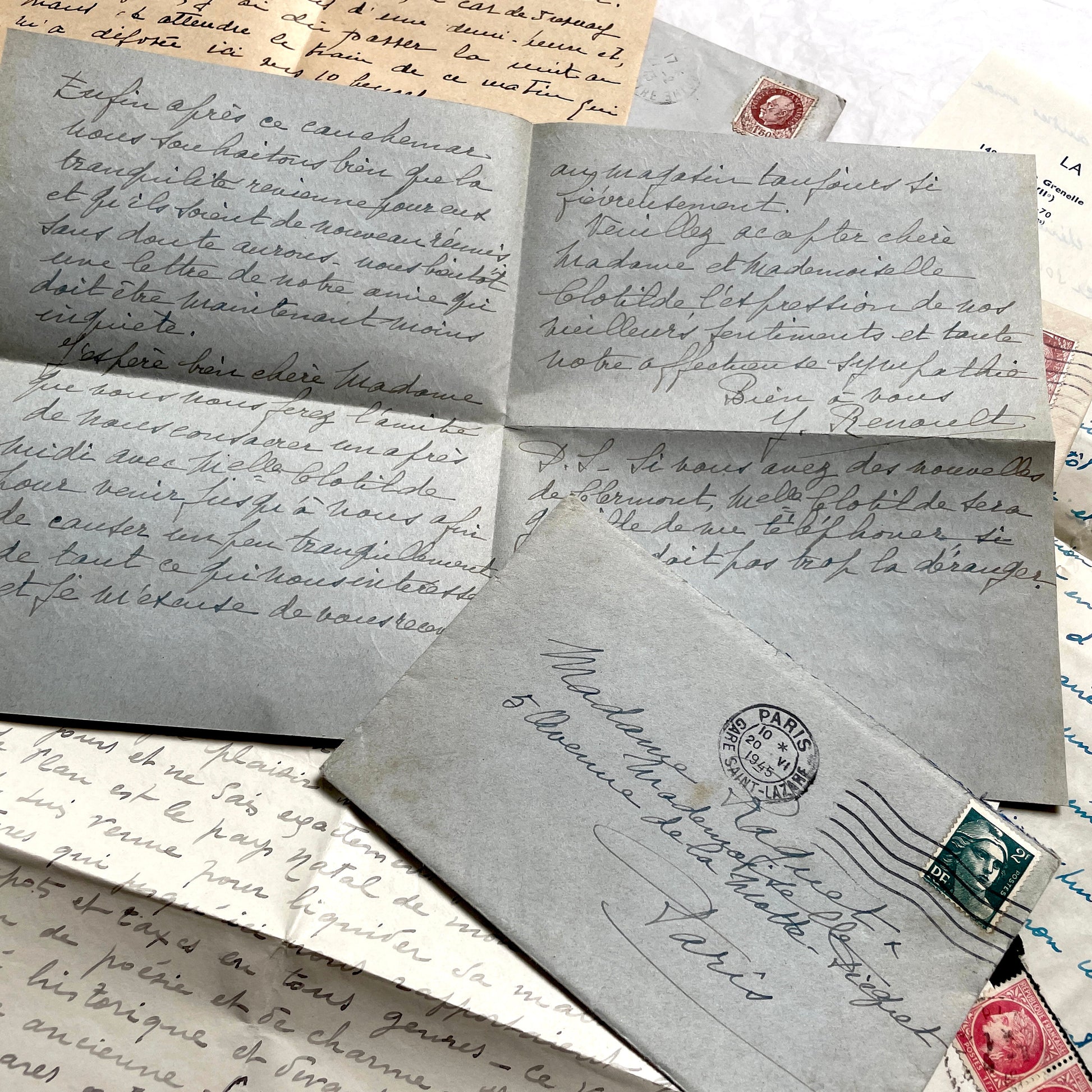 Lot of 1940s French handwritten letters with vintage stamps and postmarks, showcasing old European correspondence.
