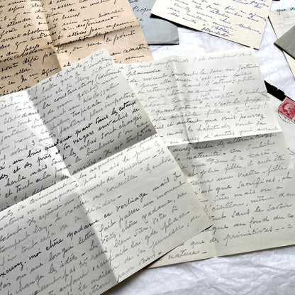 Lot of 1940s French handwritten letters with vintage stamps and postmarks, showcasing old European correspondence.