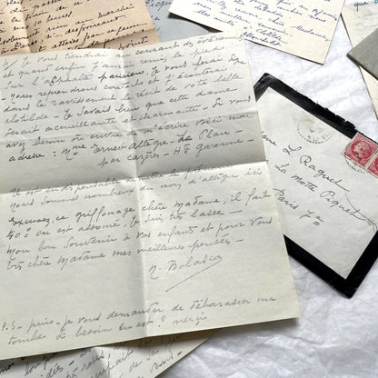 Lot of 1940s French handwritten letters with vintage stamps and postmarks, showcasing old European correspondence.