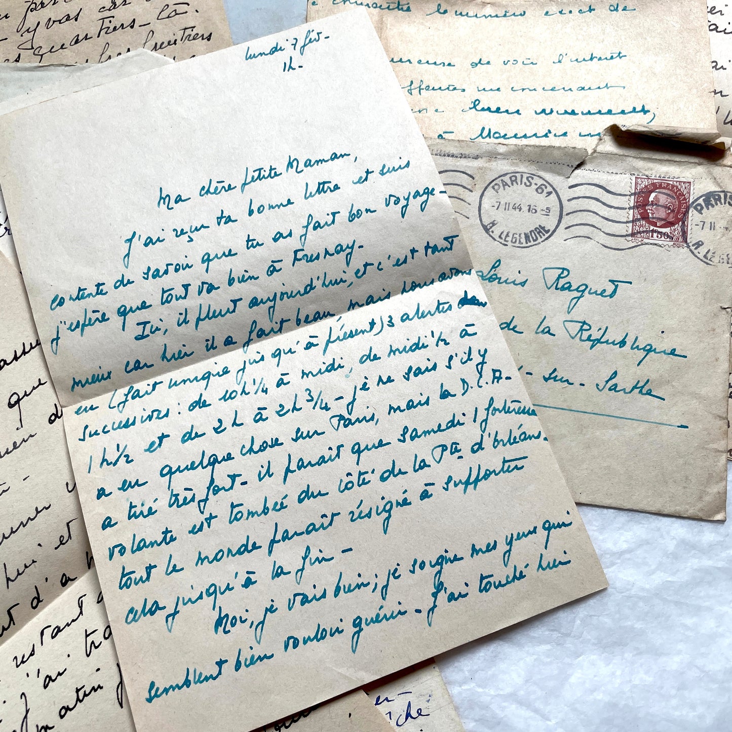 1940s French handwritten letters lot with envelopes and wartime stamps, showcasing vintage paper and cursive script.