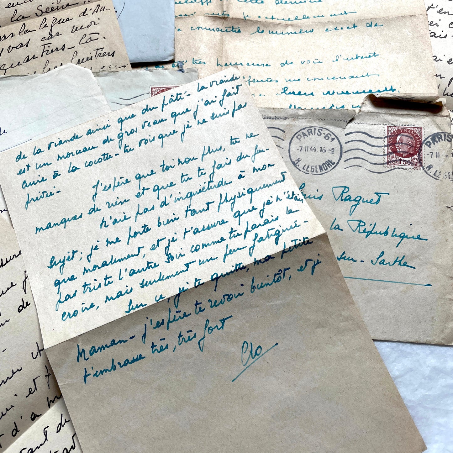 1940s French handwritten letters lot with envelopes and wartime stamps, showcasing vintage paper and cursive script.