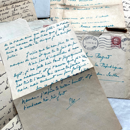 1940s French handwritten letters lot with envelopes and wartime stamps, showcasing vintage paper and cursive script.