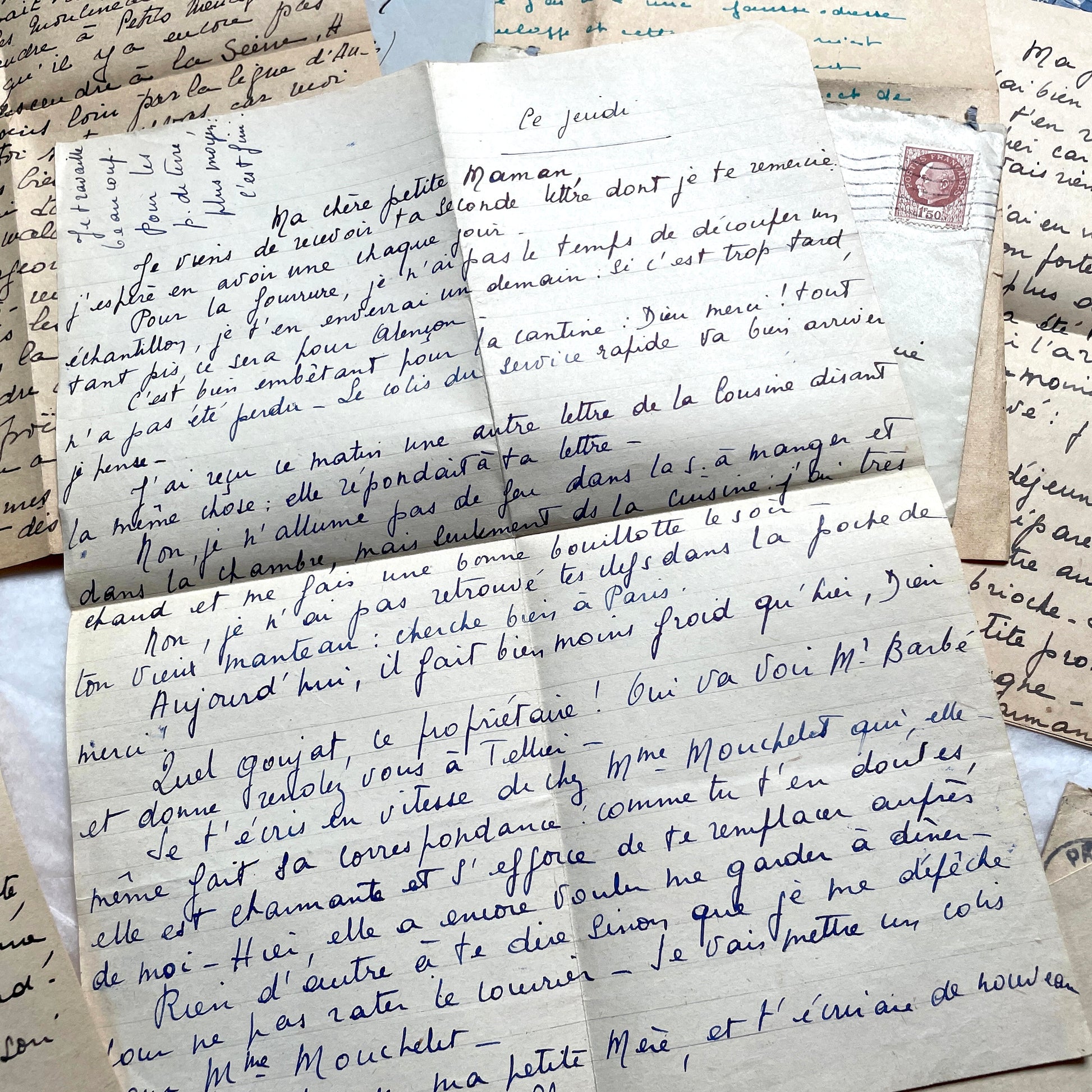 1940s French handwritten letters lot with envelopes and wartime stamps, showcasing vintage paper and cursive script.