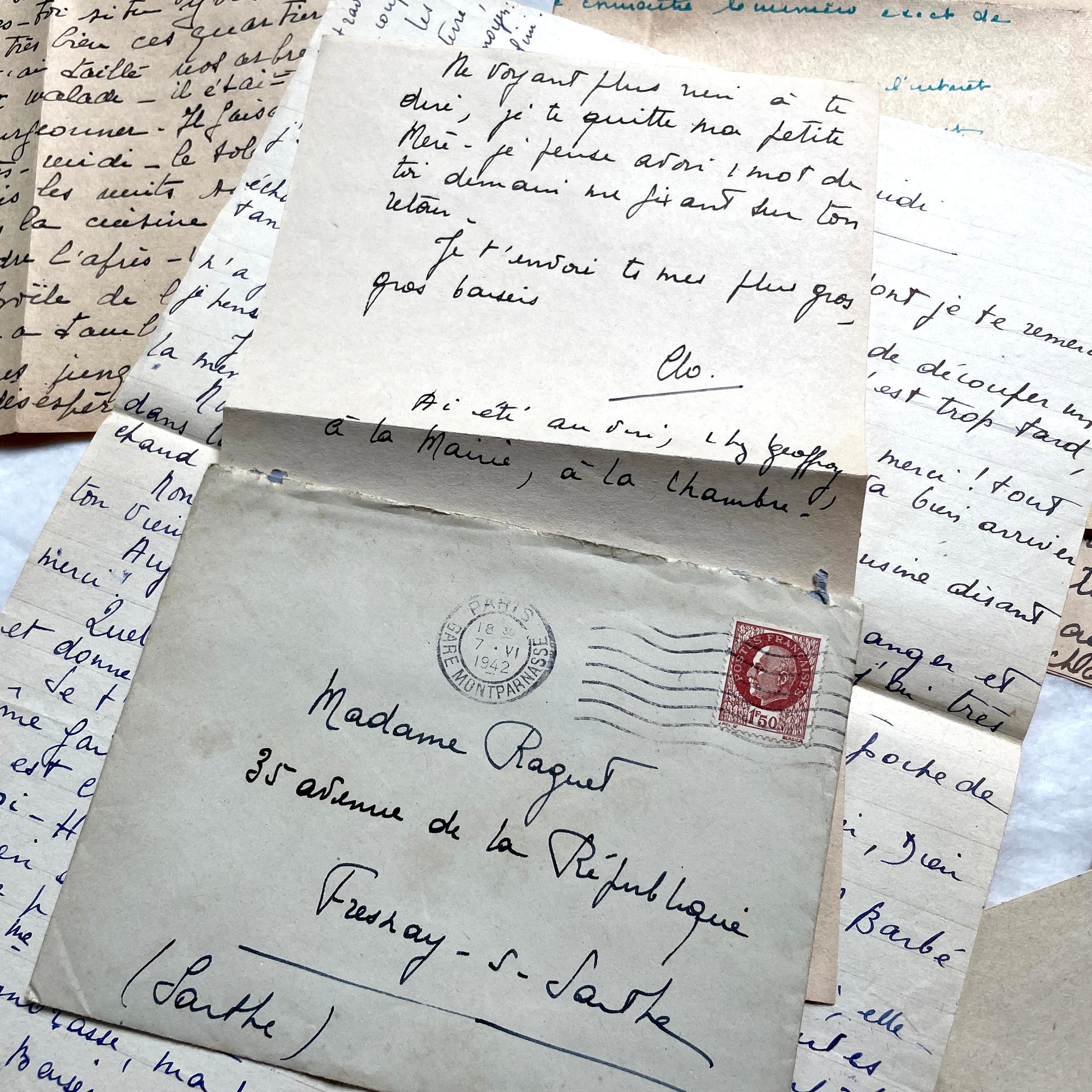 1940s French handwritten letters lot with envelopes and wartime stamps, showcasing vintage paper and cursive script.