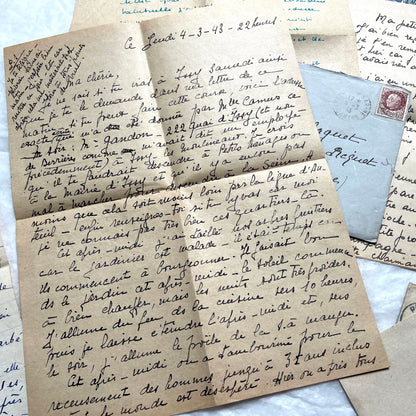 1940s French handwritten letters lot with envelopes and wartime stamps, showcasing vintage paper and cursive script.