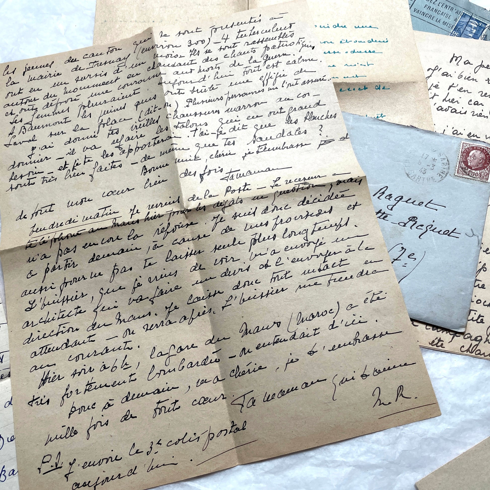 1940s French handwritten letters lot with envelopes and wartime stamps, showcasing vintage paper and cursive script.