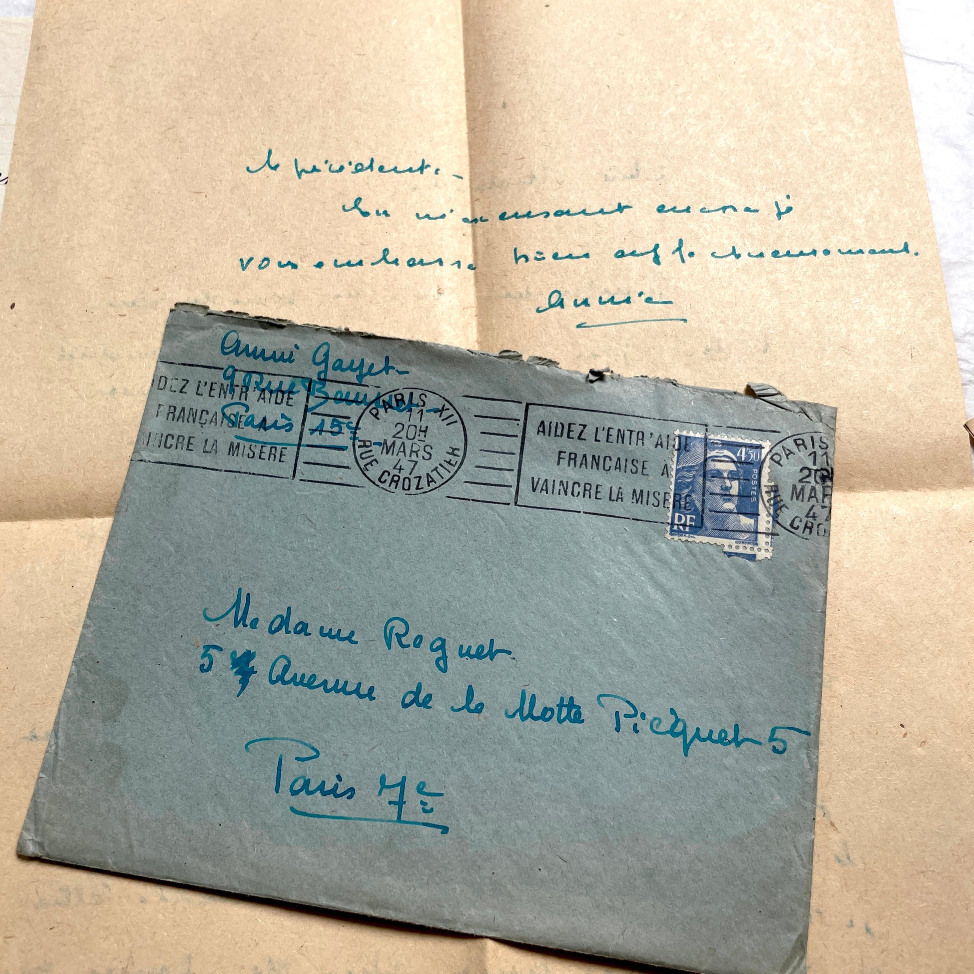 1940s French handwritten letters lot with envelopes and wartime stamps, showcasing vintage paper and cursive script.