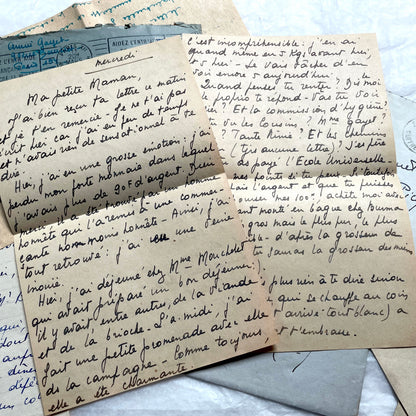 1940s French handwritten letters lot with envelopes and wartime stamps, showcasing vintage paper and cursive script.