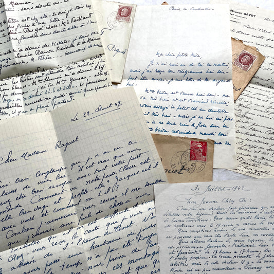 1940s French handwritten letters collection with stamps and postmarks, showing elegant blue ink script on paper.