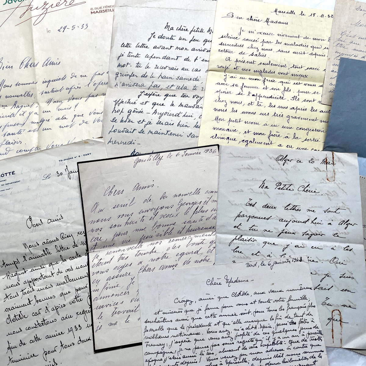 Set of 10 vintage French handwritten letters from the 1930s, showing varied elegant script and paper.