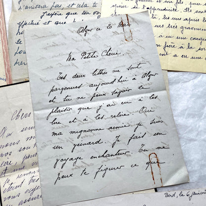 Set of 10 vintage French handwritten letters from the 1930s, showing varied elegant script and paper.