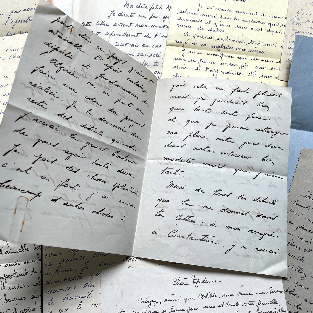 Set of 10 vintage French handwritten letters from the 1930s, showing varied elegant script and paper.
