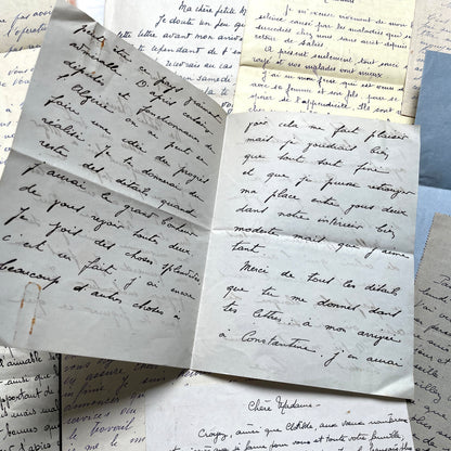 Set of 10 vintage French handwritten letters from the 1930s, showing varied elegant script and paper.
