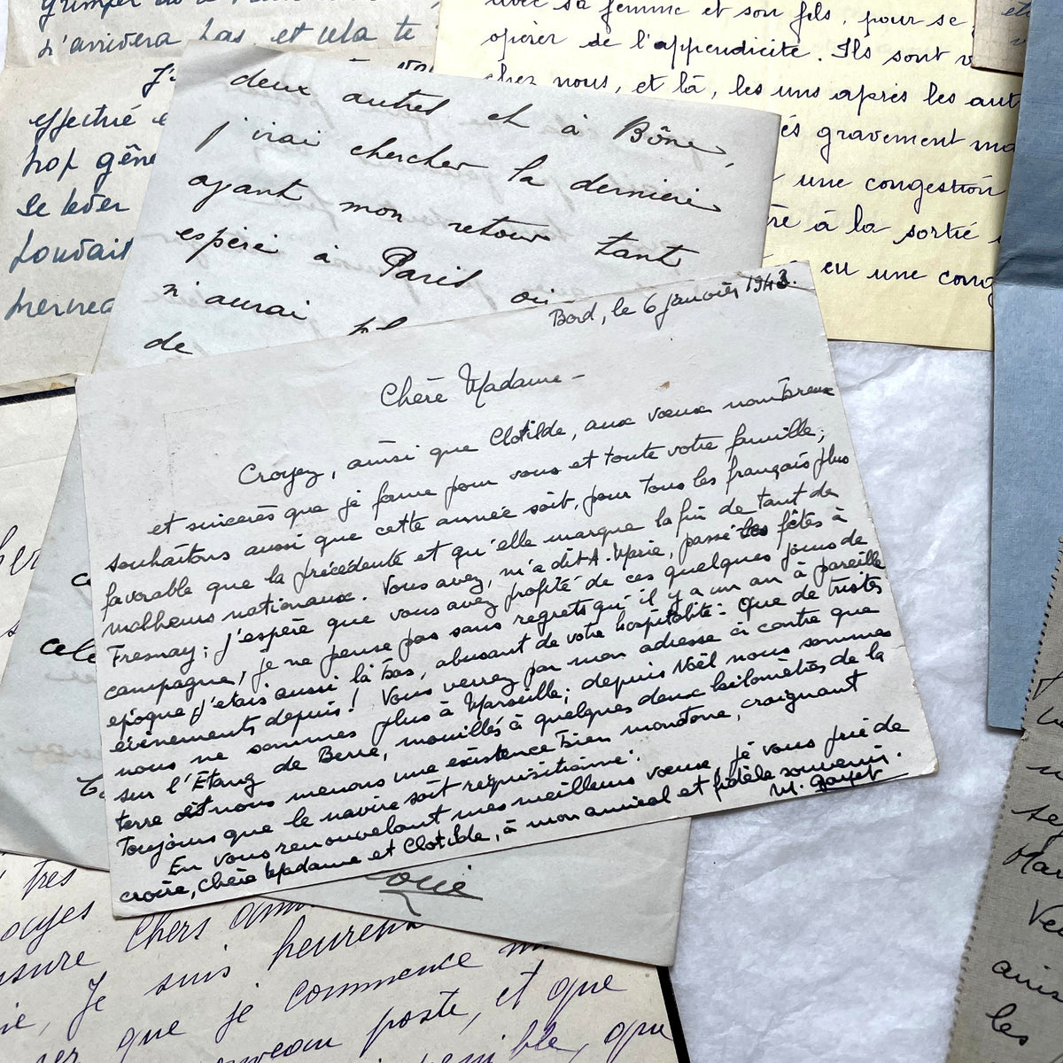 Set of 10 vintage French handwritten letters from the 1930s, showing varied elegant script and paper.